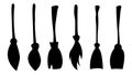 Set of silhouettes of witch brooms. Collection of items for the holiday Halloween. Vector illustration. Royalty Free Stock Photo