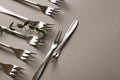 Set of silver forks on grey background Royalty Free Stock Photo