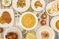 set of simple dishes of Spanish food. Roast chicken, stuffed cannelloni, Russian salad with belly, Spanish omelette, Milanese with Royalty Free Stock Photo