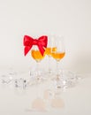 Set of single malt tasting glasses, single malt whisky in a glasses, white background, red bow Royalty Free Stock Photo