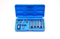 A set of single-sided chrome steel bits in a blue plastic box Royalty Free Stock Photo