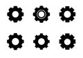 A set of six black gears icons isolated on white background. - Vector Royalty Free Stock Photo