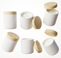 Set of six different views of white concrete container candle with cotton wick in jar with wooden lid 3D render, luxury