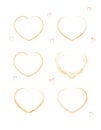 Set of six hand drawn golden hearts isolated on white background. Decorative golden glitter heart icons doodle for valentines day Royalty Free Stock Photo