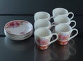 Set of six porcelain cups of coffee Royalty Free Stock Photo