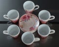 Set of six porcelain cups of coffee with texture Royalty Free Stock Photo