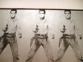 Triple Elvis art piece featuring a photo of Elvis