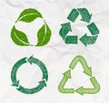 Set of sketch doodle recycle reuse symbol isolated on crumpled paper background. Recycle sign for ecological design zero waste