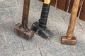 Set of sledgehammers iron and heavy hammer worn for the formation of metal in the forge Royalty Free Stock Photo
