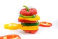 Set of sliced green yellow and red bell pepper