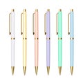 Set of slim ballpoint pens with golden buttons Royalty Free Stock Photo