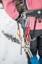 Set of slings on a harnesses in sportsman ice climbing