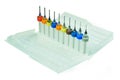 Set of small drills for small jobs in a plastic box isolated on a white background Royalty Free Stock Photo