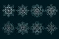 Set of snowflakes on dark background. Christmas line art ornament. Royalty Free Stock Photo