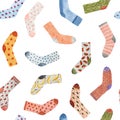 Set of socks on a white background seamless pattern. Print drawn with pencils on paper. Cozy autumn and winter illustration. New