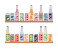 Set of soft drinks in aluminum cans and glass bottles with soda and lemonade. Carbonated non-alcoholic water with fruit, berry Royalty Free Stock Photo