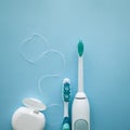 A set of sonic toothbrush, dental floss and classic toothbrush Royalty Free Stock Photo