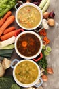 Set of soups from worldwide cuisines, healthy food. Broth with noodles, beef soup and broth with marrow dumplings. All soups with Royalty Free Stock Photo