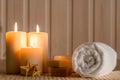 Set for spa and burning candles in dark Royalty Free Stock Photo