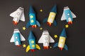 Set of spaceship, shuttle, rocket on black background with copy space for text. Concept of business launch, start up, handcraft, Royalty Free Stock Photo