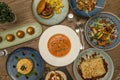 Set of Spanish and Mediterranean food dishes. salmorejo, chicken salad, serrano ham croquettes, Russian salad, creamy rice and Royalty Free Stock Photo