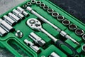 Set of spanners with ratchet in green toolbox Royalty Free Stock Photo