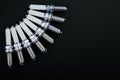 Set of 8 spark plugs on a black background Royalty Free Stock Photo