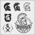 Set of spartans emblems and labels. Sport club design elements and templates. Ancient warriors, spartan spirit, gladiator helmets.