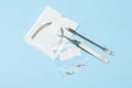 A set of special tools for an orthodontist to install braces for a patient. Orthodontic arcs, ligature, locks, positioner,