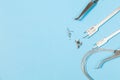 A set of special tools for an orthodontist to install braces for a patient. Orthodontic arcs, ligature, locks, positioner,