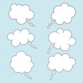 Set of speech bubbles in flat style isolated on blue background. Trendy speech clouds for chat, discussion, dialogs, dreams, ideas Royalty Free Stock Photo