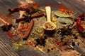 Set of spices on wooden background, close up. Wood spoon Royalty Free Stock Photo