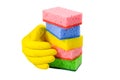 Set of sponges for washing dishes and a rubber glove isolated on a white background Royalty Free Stock Photo