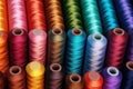 A set of spools of sewing thread in different colors. Royalty Free Stock Photo