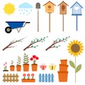 A set of spring elements, birdhouses, flowers, twigs, sunflower, garden wheelbarrow. Royalty Free Stock Photo