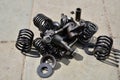 Set of springs, bolts and rocker valves