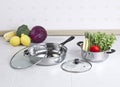 Set of stainless pot and pan Royalty Free Stock Photo