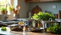 Set of stainless steel pots and pans for cooking on kitchen table with fresh herbs. Culinary tools gleam under soft light, ready Royalty Free Stock Photo