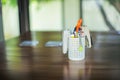 Set of stationaries in the plastic container on the wooden table Royalty Free Stock Photo