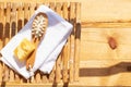 Set for a steam bath. Towel, soap and body brush. View from above. Bright sunshine and shadows