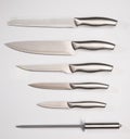 Set of steel kitchen knives, isolated on white background with clipping path. Chef knife Royalty Free Stock Photo