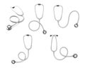 Set with stethoscopes on white background