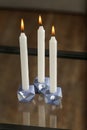 Set of stone Candle Holder with abstract smudges, blue concrete with silver flame. selective soft focus Royalty Free Stock Photo