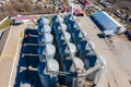 Set of storage tanks raw material agricultural crops feed mills. Aerial vew from drone Royalty Free Stock Photo