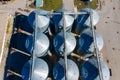 Set of storage tanks raw material agricultural crops feed mills. Aerial vew from drone Royalty Free Stock Photo