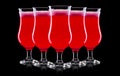 Set of strawberry cocktails in hurricane glass isolated on black background Royalty Free Stock Photo