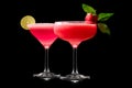 Set of strawberry daiquiri garnished with slice of lime on a black background. Classic Hemingway cocktail Royalty Free Stock Photo