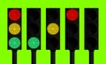 Set of street traffic lights with different light signals isolated on green background Royalty Free Stock Photo