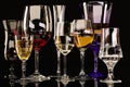 A set of strong alcoholic beverages in glasses, in the presence of whiskey, vodka, rum, brandy, tequila, on a dark background Royalty Free Stock Photo