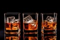 Set of strong alcoholic drinks in glasses and shot glass in assortent: vodka, rum, cognac, tequila, brandy and whiskey. Dark Royalty Free Stock Photo